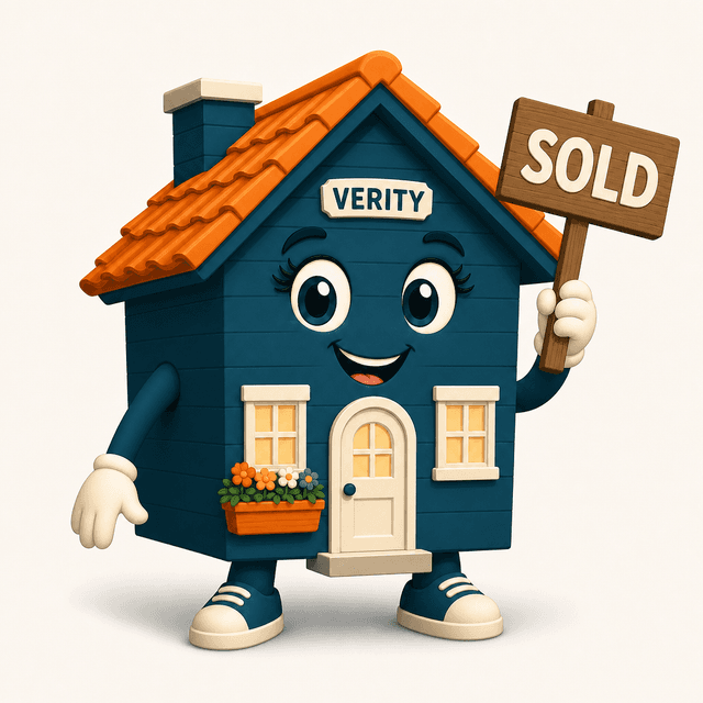 Verity holding a SOLD sign